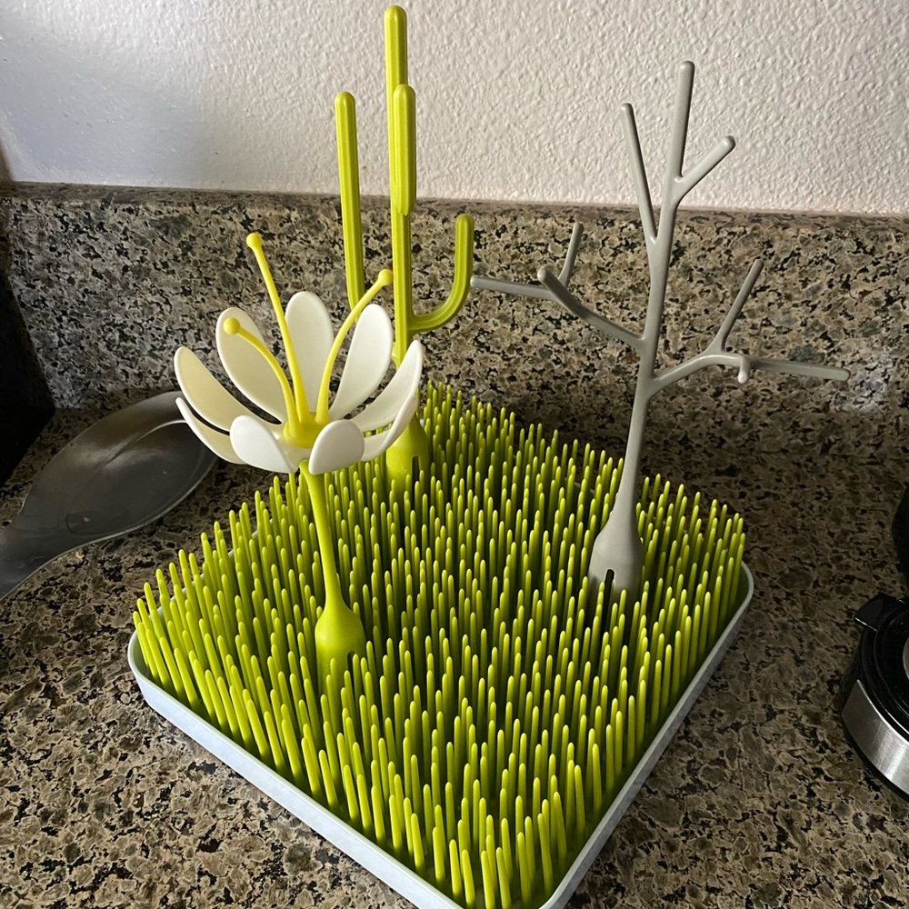 Boon lawn bottle drying rack with twig, flower, and cactus accessories